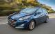 Hyundai i30: Indicateur de position de vitesse de la boîte automatique / Indicateur de 
rapport l'embrayage double (Pour l'Europe, le cas échéant) - Indicateur de changement de rapport - Combiné d'instruments - Fonctions pratiques de votre véhicule - Manuel du conducteur Hyundai i30